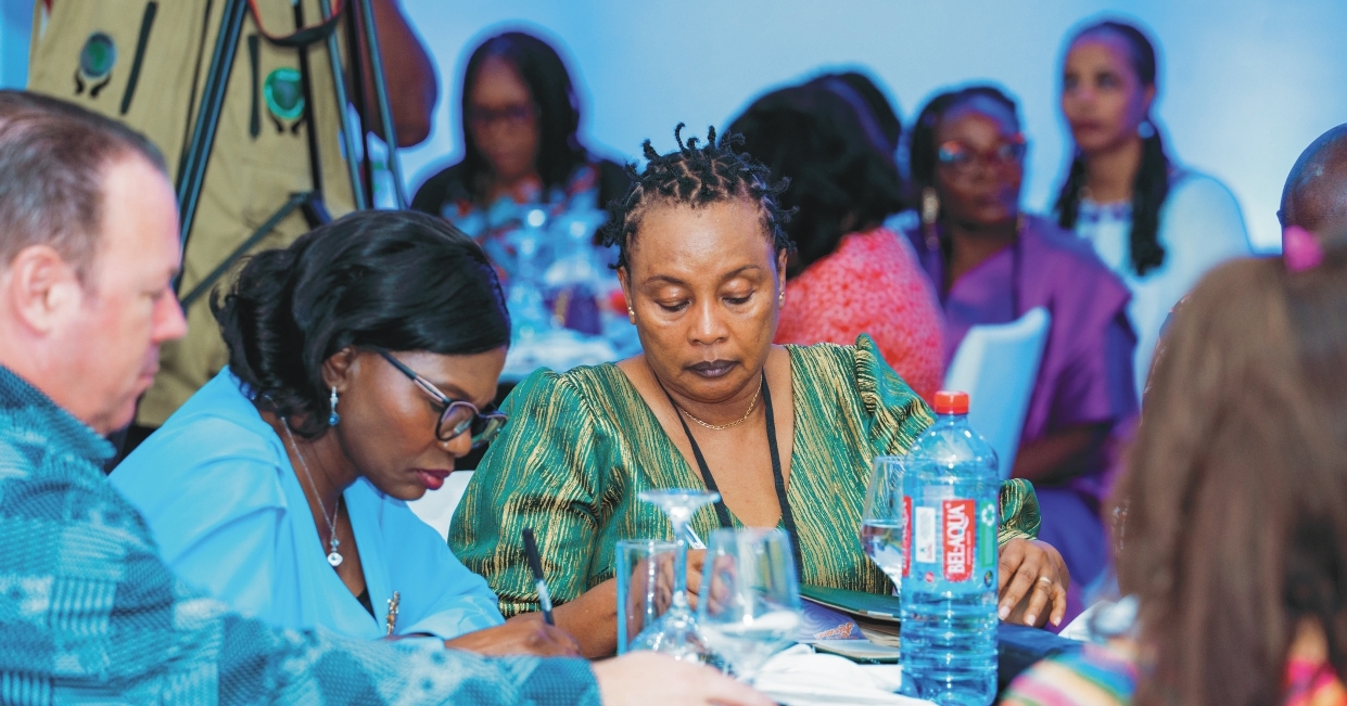 Congress participants in a focused table discussion